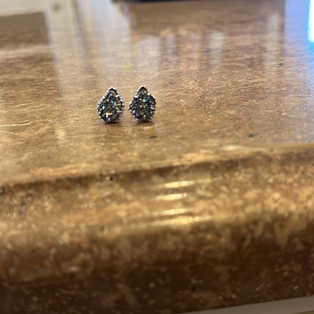 Kendra Scott earrings.